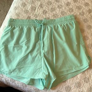 Crown and Ivy size L athletic running shorts light aqua color